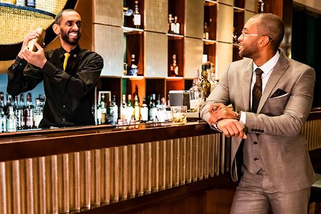 Bartender pouring cocktail